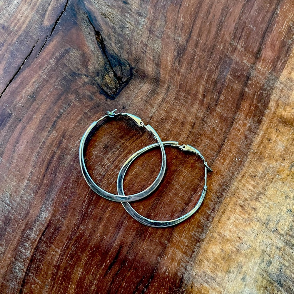 Medium size hoop earrings sterling silver. Back clasps